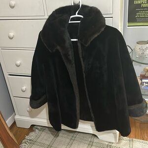 Beautiful long faux fur black coat.